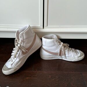 adorable nike high tops in pink.